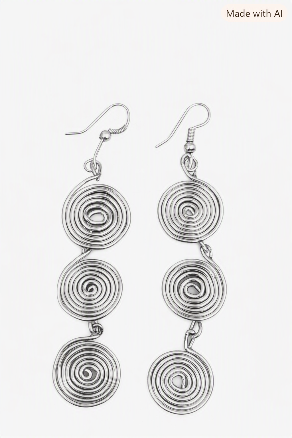 A set of a pair of earrings and ear cuff